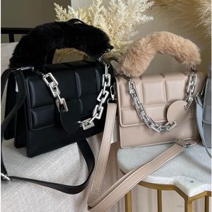 Faux fur handle bag